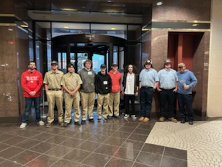 Students standing in a line that participated in the skills competitions